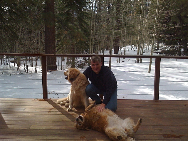 Dakota gets a tummy rub on the deck